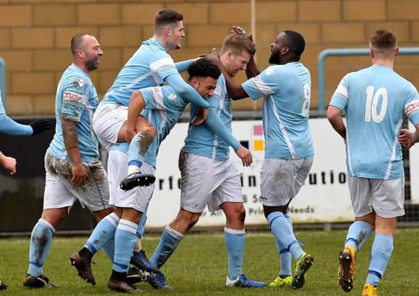 Mason Rowley is mobbed after scoring against Basford    PICTURES BY MARTIN PULLEY