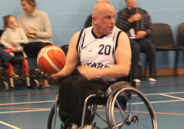 Warwickshire Bears' Adrian Taber in action against his former club.
