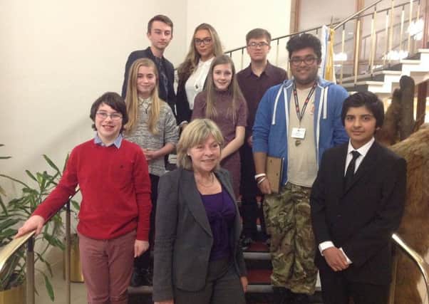 Councillor Izzi Seccombe, Leader of Warwickshire County Council, with  Members to the UK Youth Parliament (MYPs).