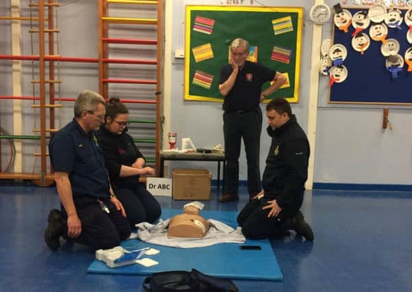 Parents at Brookhurst Primary School learnt lifesaving skills with Warwickshire Hearts.