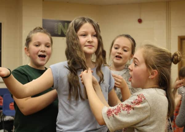 Youngsters rehearsing for The Wizard of Oz, coming to the Benn Hall