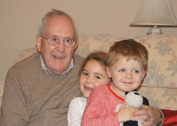 Arthur Boyd with his grandchildren Juliet and Noah.