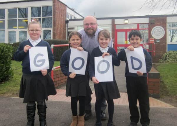 Boughton Leigh Infant School head Andrew Moorcroft celebrates the good news with year 2 pupils Fearne Priest, Dulcie Cooper, Isabelle Callaghan and Raghav Bhide.. NNL-170203-135604001