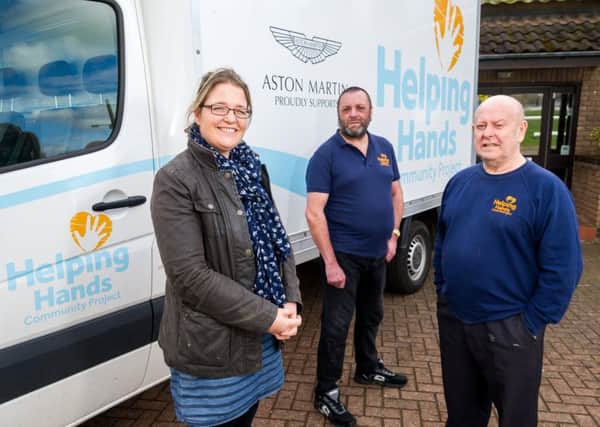 The Helping Hands Team, pictured outside their present premises, at Stoneleigh Park.  They have to move from them soon and are now looking for an alternative site, to operate the charity from and store the furniture they provide to people in need. NNL-170703-215758009