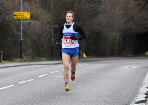 Leamington C&AC's Andy Savery on his way to victory in the Warwick Half. Pictures: Morris Troughton