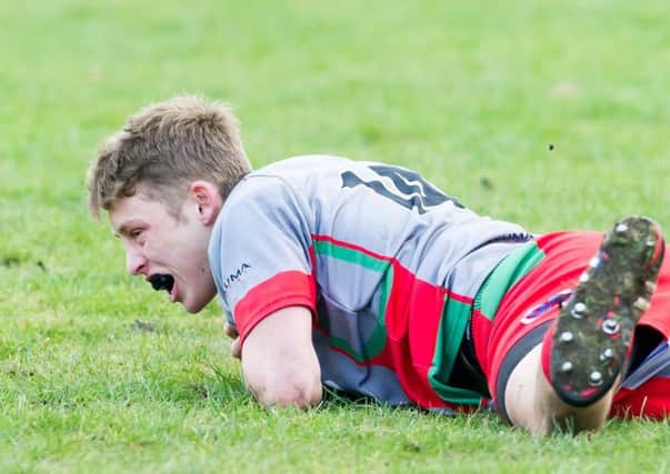 George Lowe scored two tries for Rugby Welsh against Trinity Guild