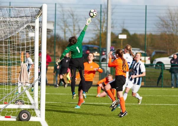 Goalmouth action from Sunday's cup game  PICTURES BY BRIAN DAINTY