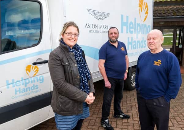 The Helping Hands Team, pictured outside their present premises, at Stoneleigh Park.  They have to move from them soon and are now looking for an alternative site, to operate the charity from and store the furniture they provide to people in need. NNL-170703-215659009