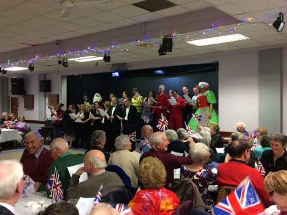 Visitors enjoying themselves at the Senior Citizens Party