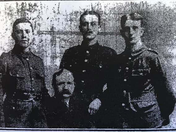 Tom Reynolds with his three sons who died, (from left) Herbert, Jack and Frank.