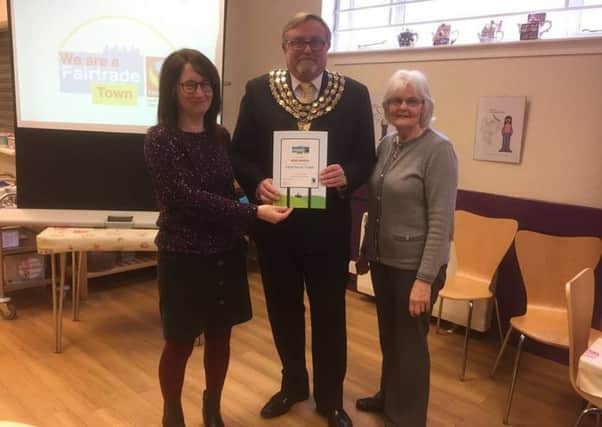 From left: Sarah Proctor, Kenilworth mayor Cllr Richard Davies, and Kath Shortley, the founder of England's first ever Fairtrade shop