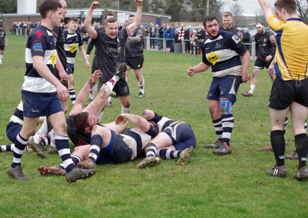 Joe Higgins celebrates a try for Sam Herrington in Lions' win at Southam   PICTURE BY RAY ANDREWS