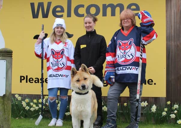 Elizabeth Hayward and Carol Waite with Michelle Franklin, centre and Ice the Akita. Picture submitted