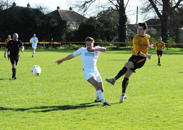 Wade Malley fires home for Racing Club Warwick against Lichfield. Picture: Morris Troughton