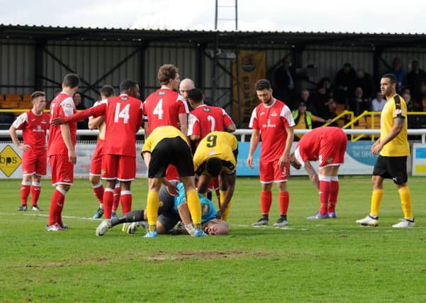 Tony Breeden is congratulated after winning a late penalty against Frome. However, Stefan Moore saw the resulting spot-kick saved. Picture: Morris Troughton