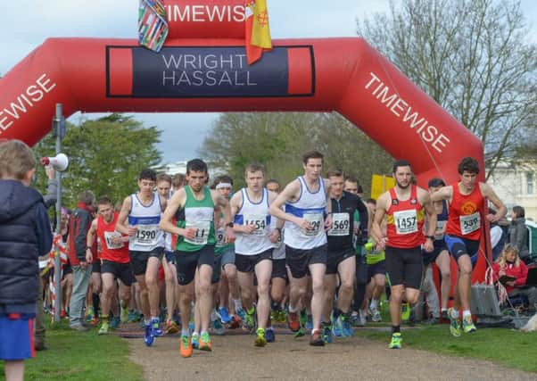 Runners cross the start line for the Wright Hassall Leamington Regency 10k.