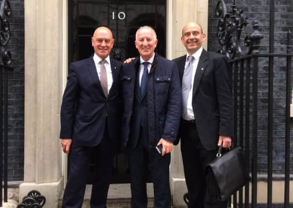 Martin Banbury, Nick Newbold and Toby Porter, Acorns Chief Executive outside 10 Downing Street.