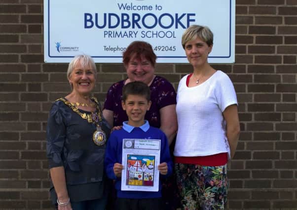 Jacob Loveridge from Budbrooke Primary School was chosen as the competition winner by Warwick mayor Christine Cross. Photo by CJ's Events Warwickshire.