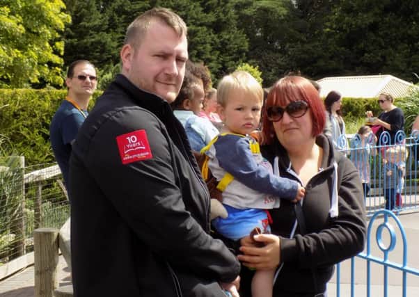 Andrew Bowell, Michelle Lawley and their son.