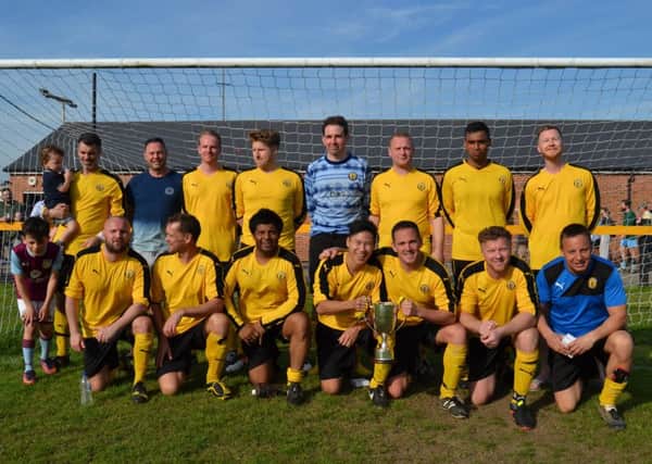 Leamington FC Veterans show off the Division Three Cup after overcoming Dynamo Leamington, pictured below. Pictures submitted