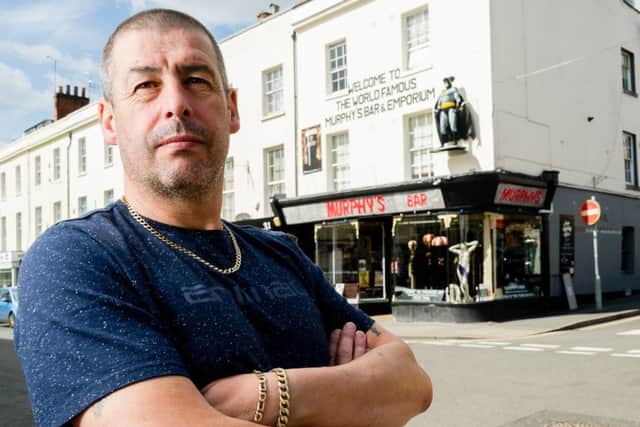 Owner Kevin Murphy is campaigning to keep the Batman statue up above the front window of the bar and to keep a number of other alterations he has made to the front of the building. NNL-170419-085313009