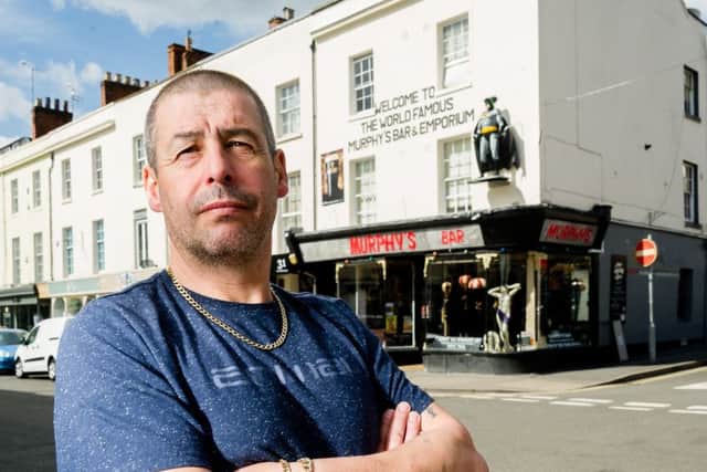 Owner Kevin Murphy is campaigning to keep the Batman statue up above the front window of the bar and to keep a number of other alterations he has made to the front of the building. NNL-170419-085254009