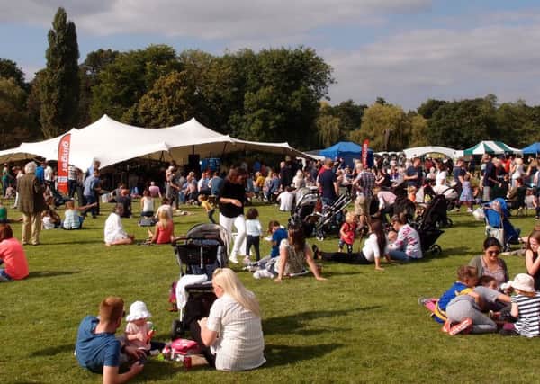 Crowds enjoy the Fiesta in Abbey Fields at the Kenilworth Arts Festival.