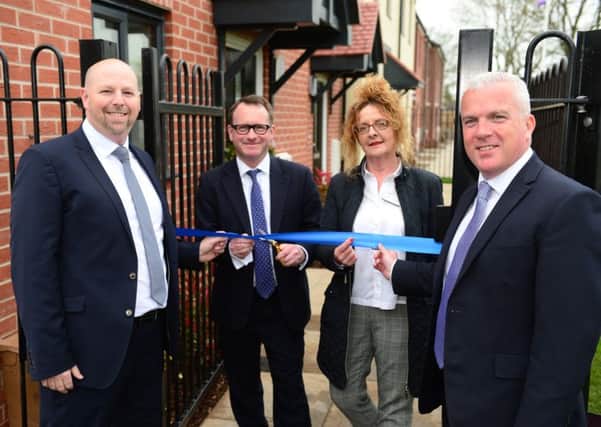 Left to right: Chris Jones, development director at Orbit, Chris White MP for Warwick and Leamington, Kim Craig, sales and marketing manager and Martin Gallagher, managing director of Deeley Construction.
 
Photo by Steve Baker