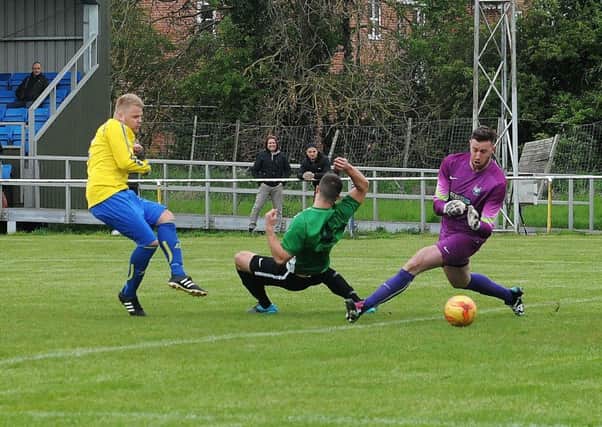 Luke Sanders opens the scoring for Southam United at home to Chelmsley Town. Picture: Morris Troughton