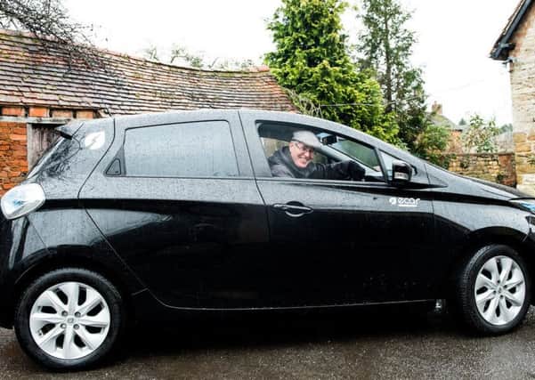 Bob Sherman driving one of the Renault Zoe Cars for the Harbury e-Wheels scheme.