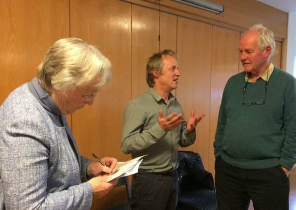 Warwick District Council chairwoman Cllr Jane Knight takes notes while Dave Anderson the council's greenspace team manager speaks with park user Malcolm Burns.