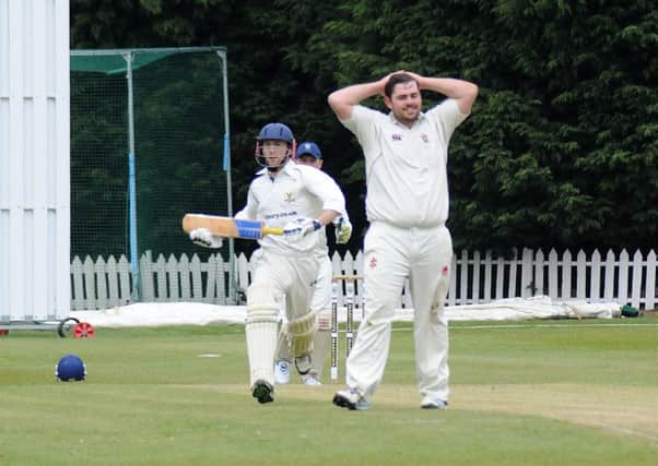 Premier 2nd XI Division: Leamington v Kenilworth Wardens. 
George Stow (Leamington) has just allowed Dan Phillips to hit a mighty shot.
MHLC-29-04-17 Leamington CC NNL-170429-211323009