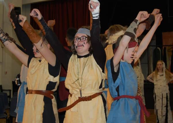 Harris Academy drama students perform The Snow Dragons by Lizzie Nunnery at National Theatre's Connections Festival at Royal and Derngate theatre in Northampton. Photo: Harris Academy NNL-170405-121958001