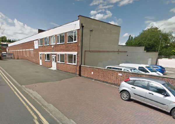 A building that would be demolished for the application on Nelson Lane. Photo by Google Maps.