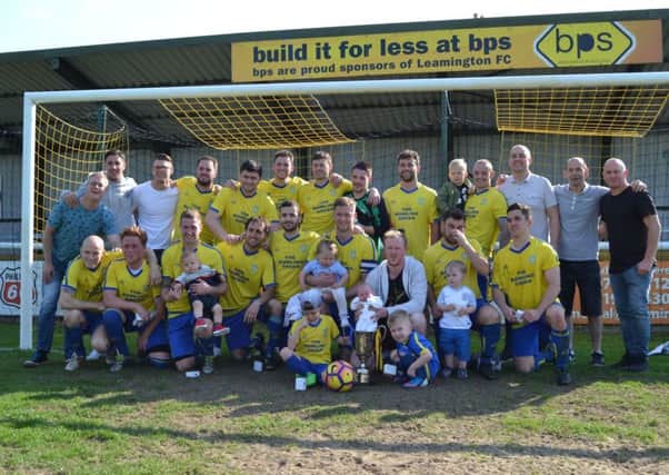 Westlea Wanderers celebrate their Cancer Cup final success.