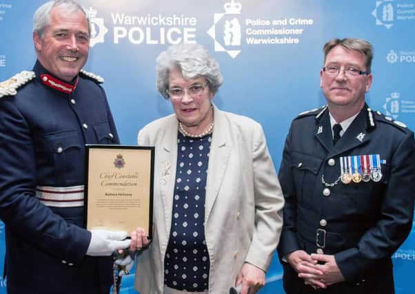 Barbara Holloway with The Lord Lieutenant of Warwickshire, Tim Cox and Chief Constable Martin Jelley.