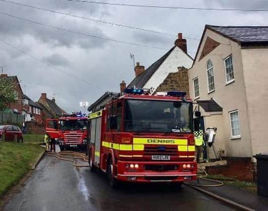Fire crews at the scene of the house fire in Napton, caused by a pet snake.