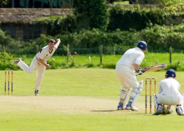 Jamie Brightwell  bowling for Oakfield   PICTURES BY MIKE BAKER