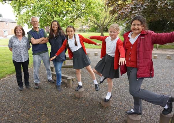 From left to right: Corenna Jennings (Barford Village Shop Manager), John Murphy (Parish Councillor - Barford, Sherbourne & Wasperton Joint Parish Council), Amanda Griffin (Chair of Barford village Shop), Keya Ray, Eve Baker and Zahra Nacer (Barford St. Peter's CE Primary School pupils).