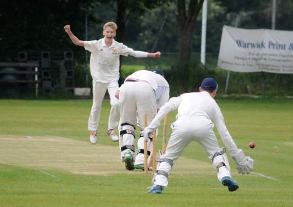 Kenilworth Wardens 2nds' Tommy Rex celebrates the wicket of Knowle & Dorridge's Chris Kenny. Picture: Morris Troughton