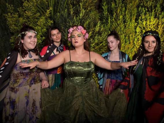 Titania and her fairies in A Midsummer Night's Dream