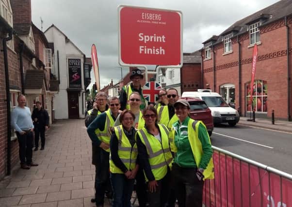 All smiles from the marshals as they prepare for the cyclists to power through Kenilworth