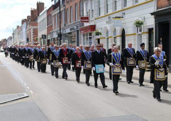 The Warwickshire Freemasons parade in Warwick