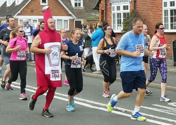 Steve Atherton taking part as a sauce bottle in the Two Castles run.