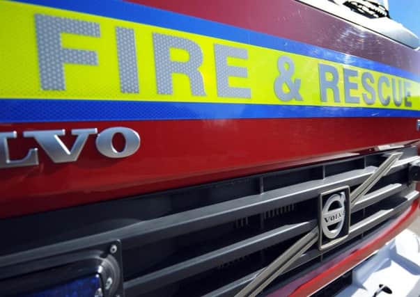 A woman was found unconscious after a fire broke out in a bungalow in Three Bridges this morning (July 19).