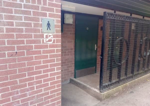 The disabled toilet in Abbey Fields. The bump by the men's toilet and the narrow walkway make it difficult to access