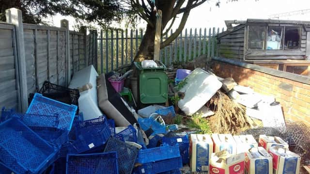 The back garden of Chen's Takeway in Rugby, which was fined Â£2,000 for food hygiene offences. The photo was taken during the inspection.