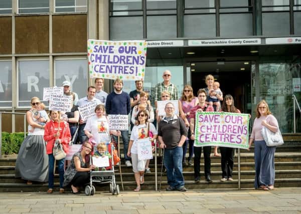 A campaign group held a protest outside Shire Hall, Warwick this week, against plans to cut children's centres across the county. NNL-170718-131247009