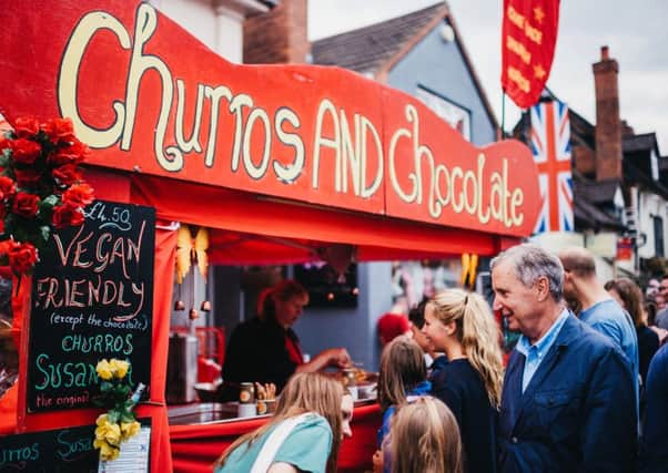 Churros and chocolate being served at Kenilworth Food Festival. Copyright: Andrew Craner Photography