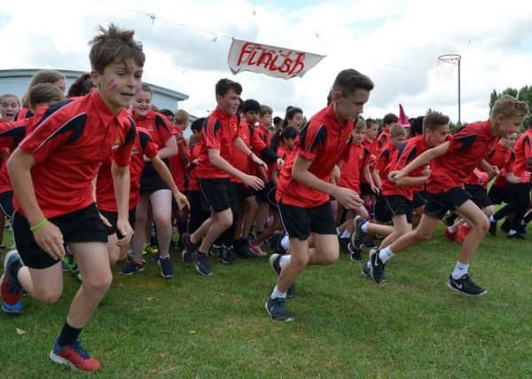 Year 7 runners at the start line of Myton School's Race for Life. NNL-170724-165141001